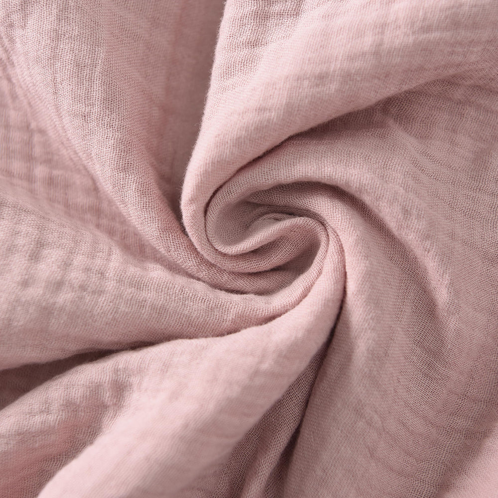 TADO MUSLIN machine-wash/dryer-friendly sheets simplify laundry for busy parents.