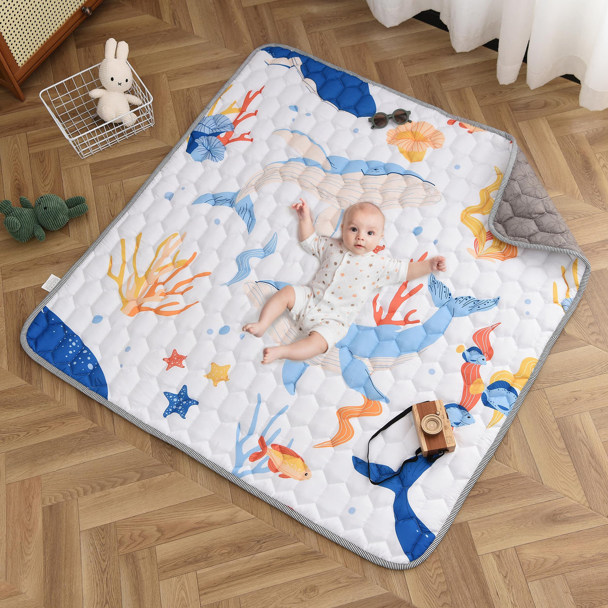 TADO MUSLIN baby play mat features soft microfiber for cozy tummy time.