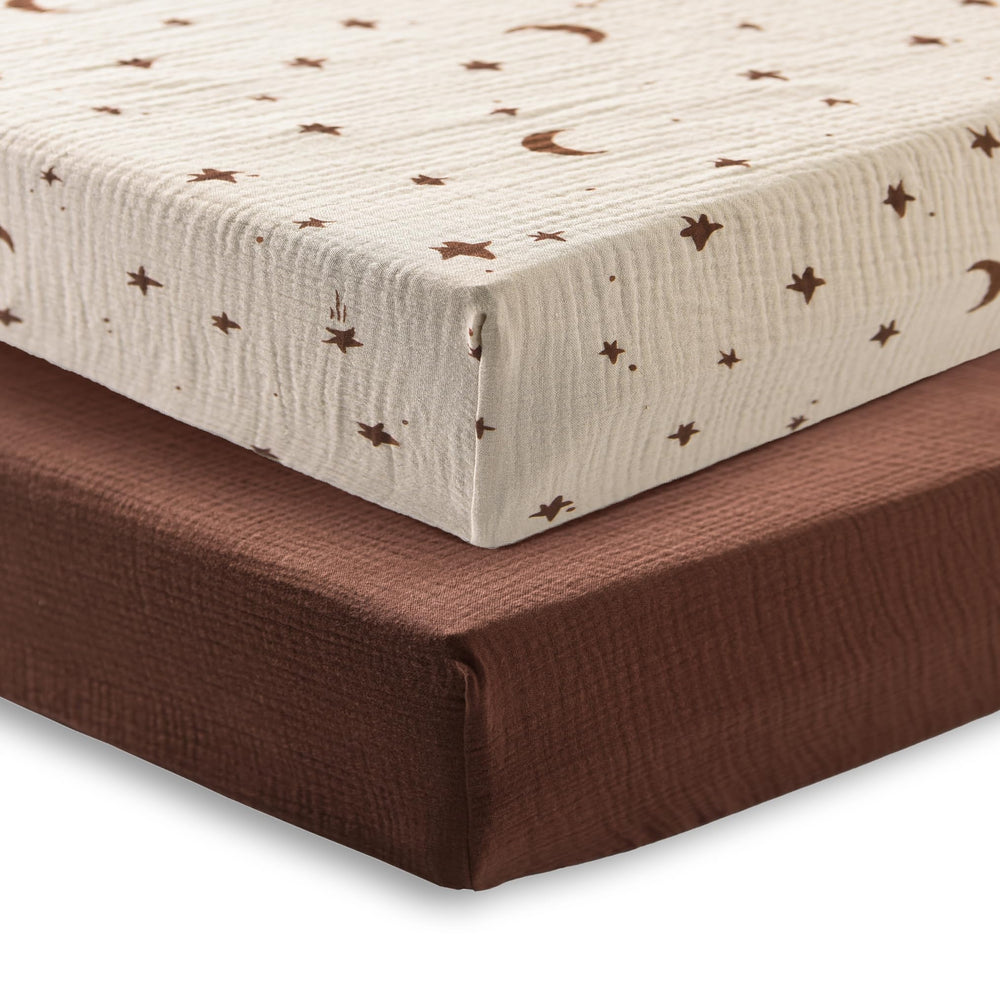 TADO MUSLIN baby sheets on crib mattress highlight snug, secure fit for safe sleep.