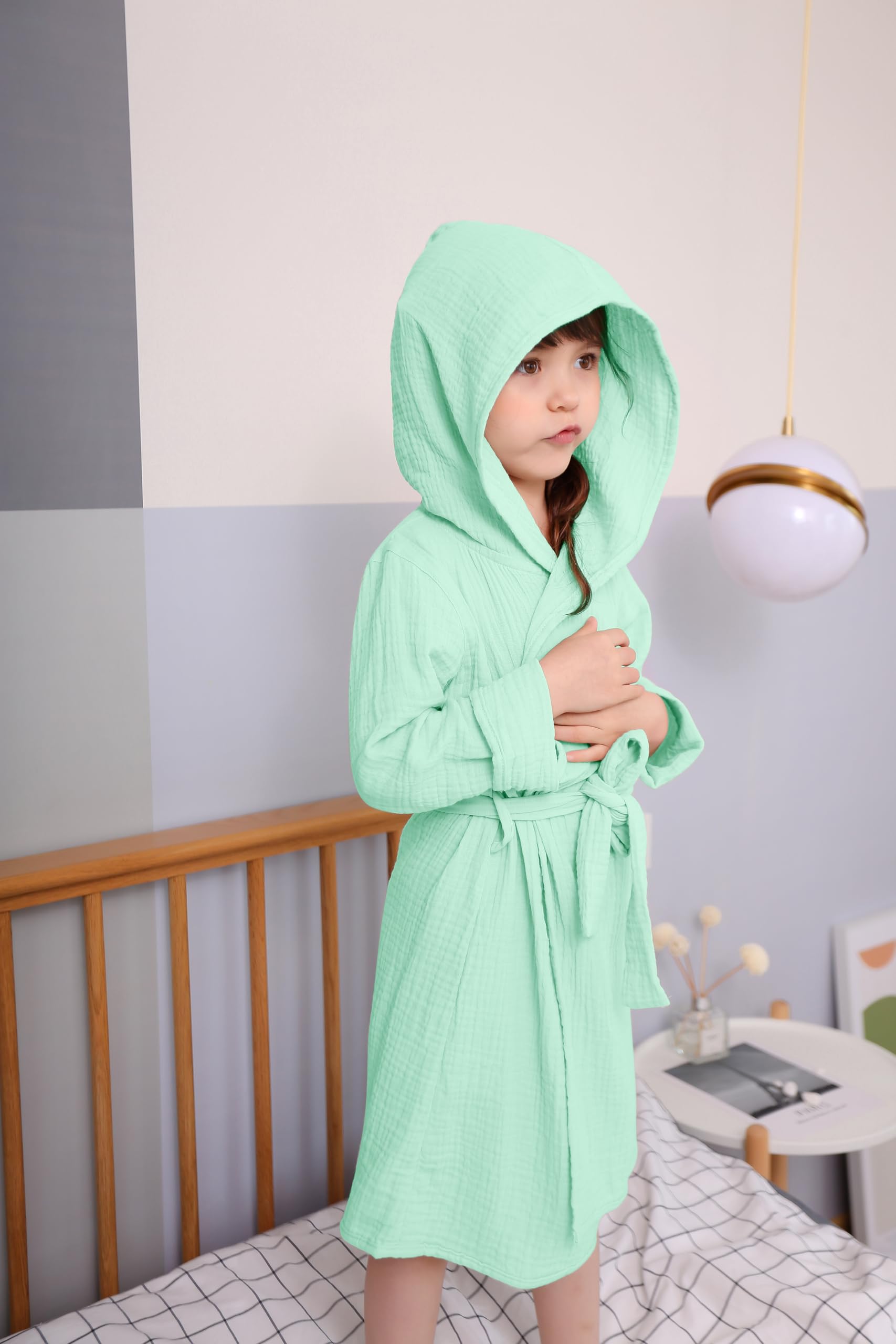 TADO MUSLIN bathrobe ultra-absorbent and breathable for quick drying bath moments.