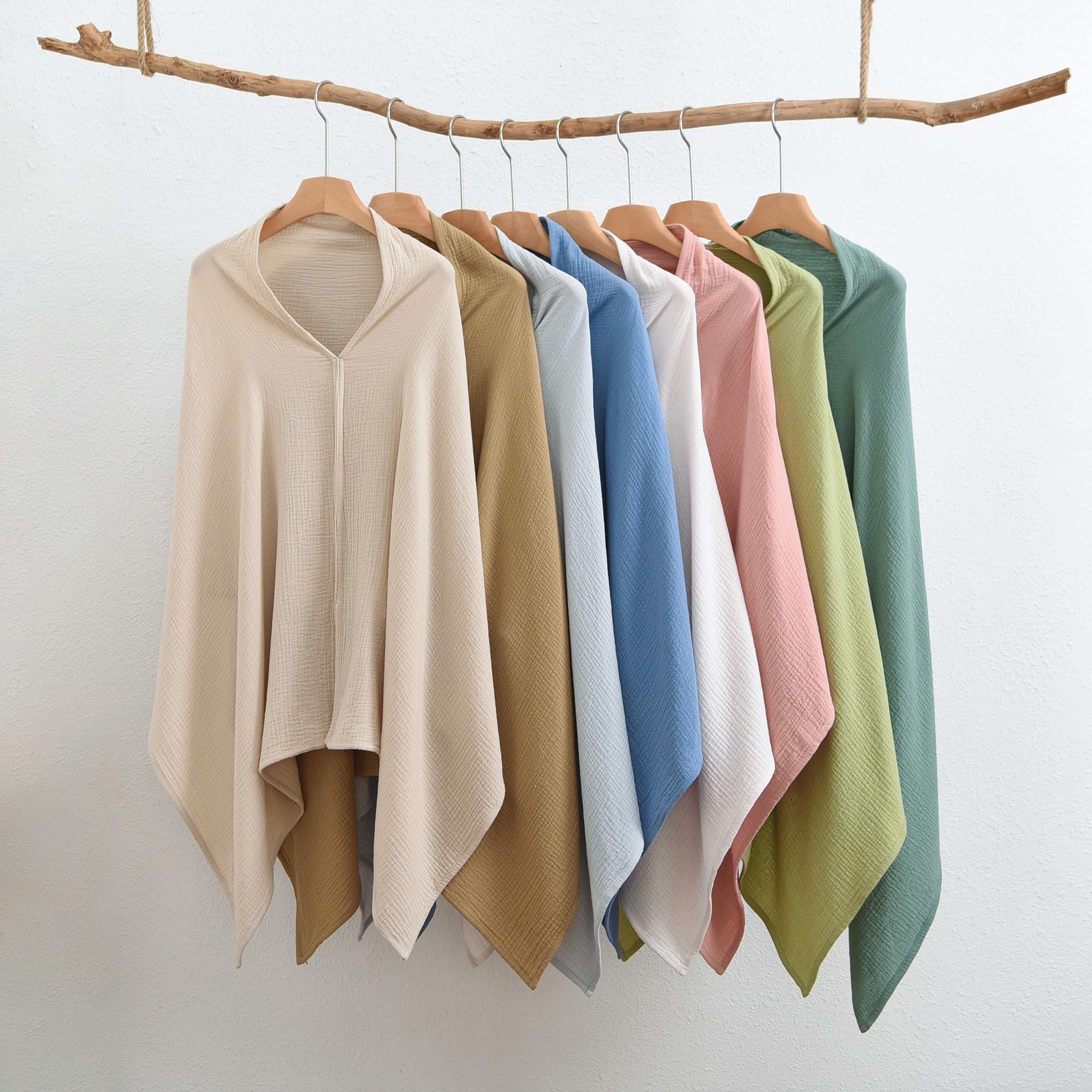 TADO MUSLIN car seat canopy offers privacy while allowing airflow.