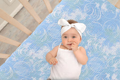 TADO MUSLIN crib sheet close-up of 360° elastic band for snug fit