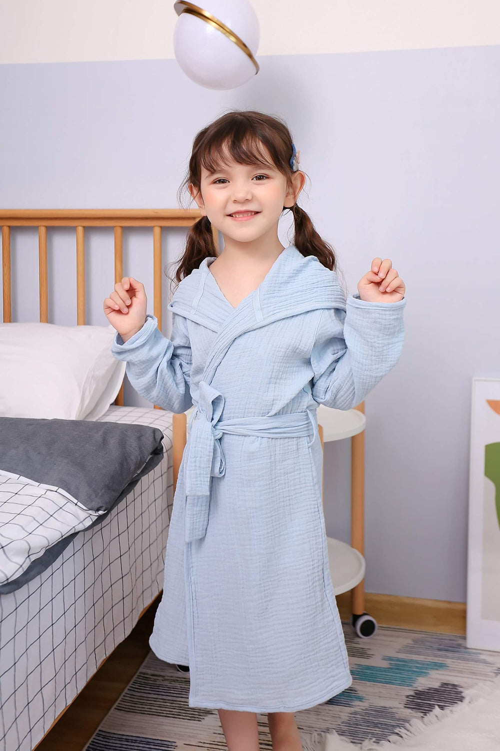 TADO MUSLIN hood detail emphasizing breathable warmth and plush feel