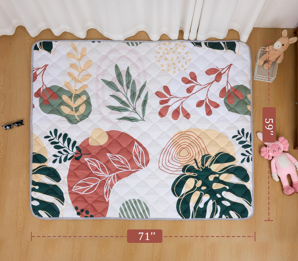 TADO MUSLIN machine-washable mat simplifies cleanup after messy play.