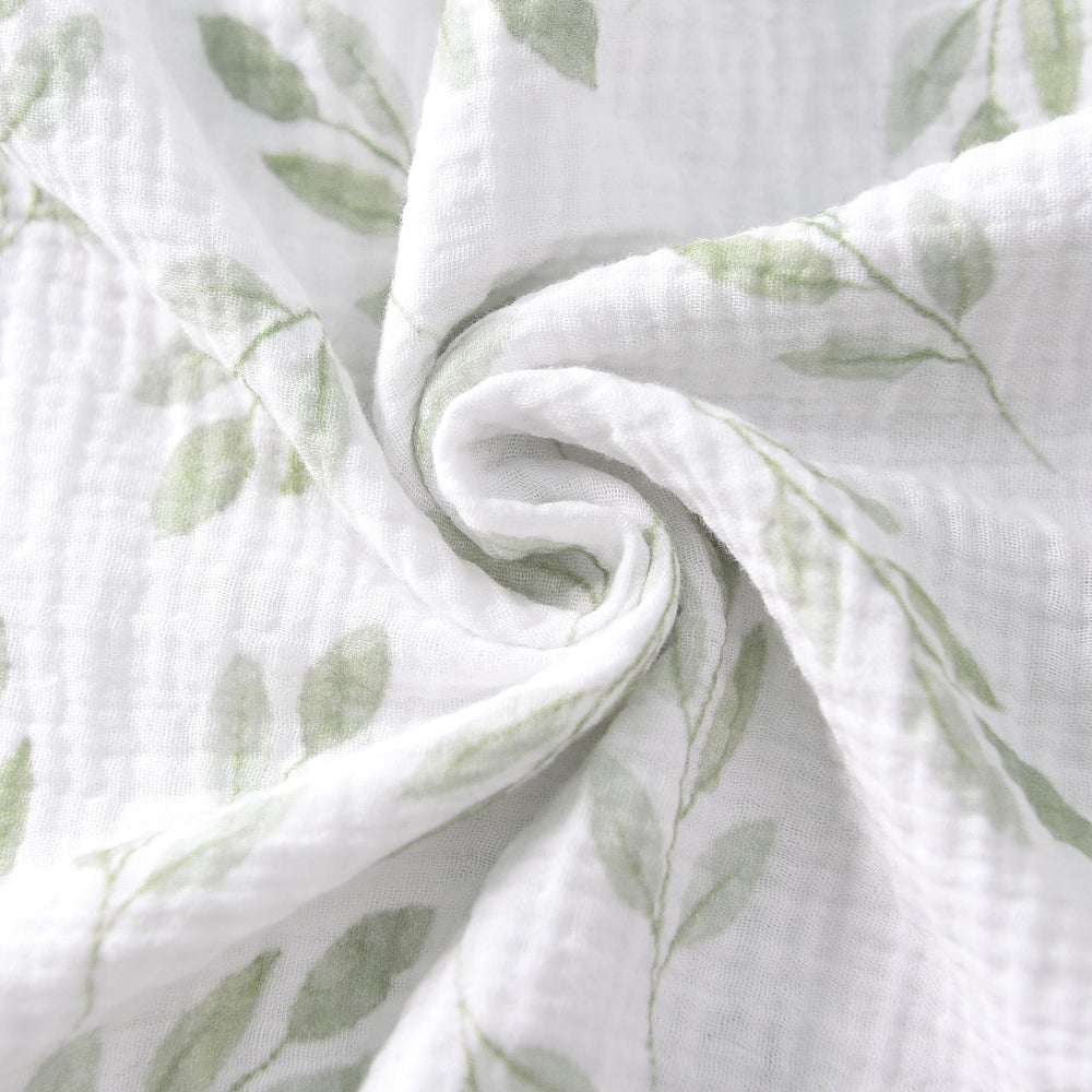 TADO MUSLIN nursery-scene; leaves-pattern crib sheets dress up any gender-neutral nursery