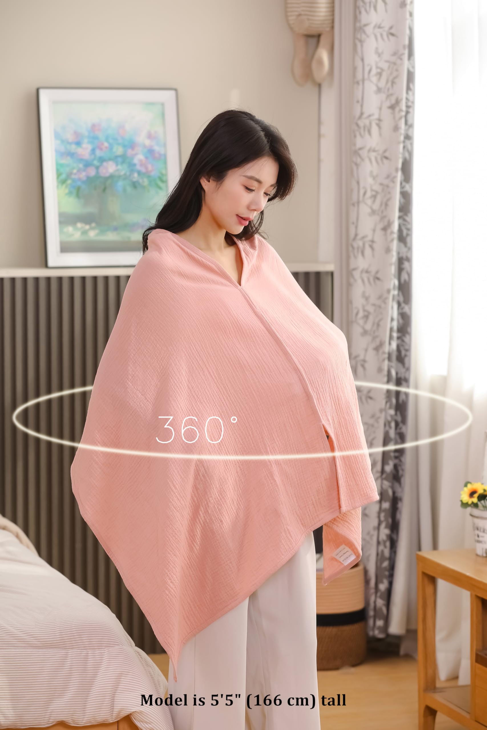 TADO MUSLIN car seat canopy offers portable privacy during rides.