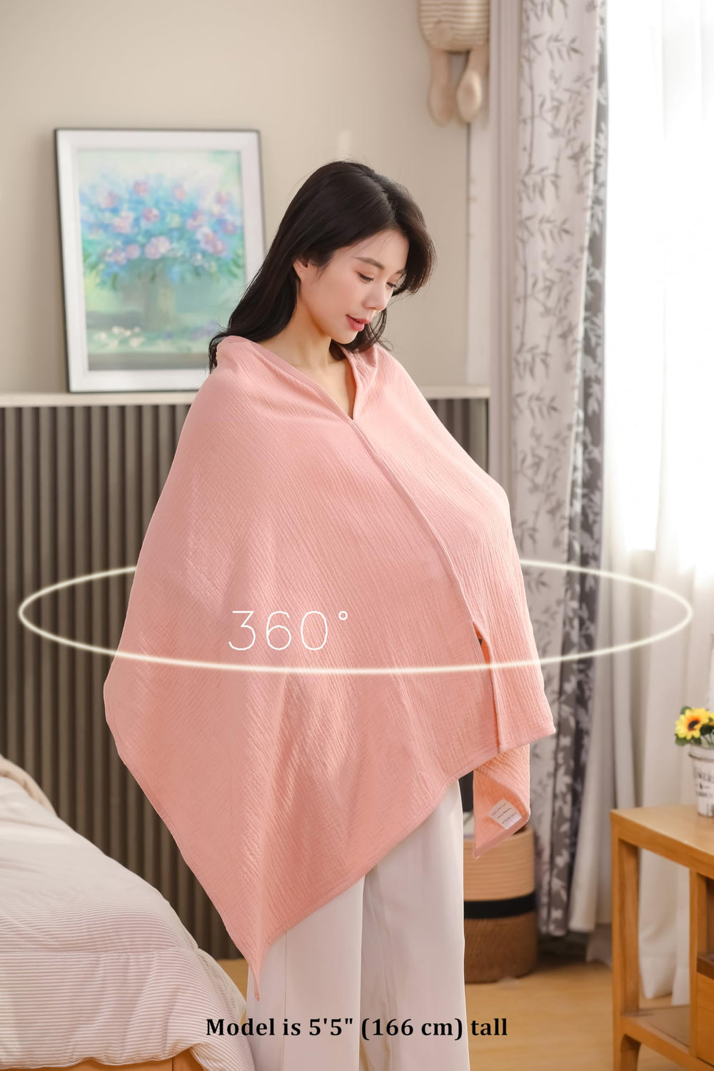 TADO MUSLIN car seat canopy offers portable privacy during rides.