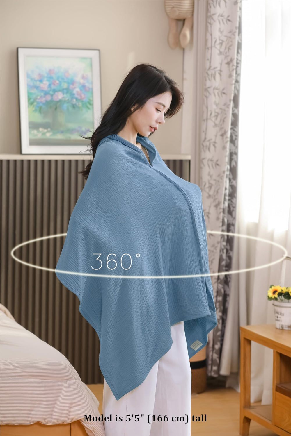 TADO MUSLIN doubles as stroller sunshade with peek-a-boo opening.