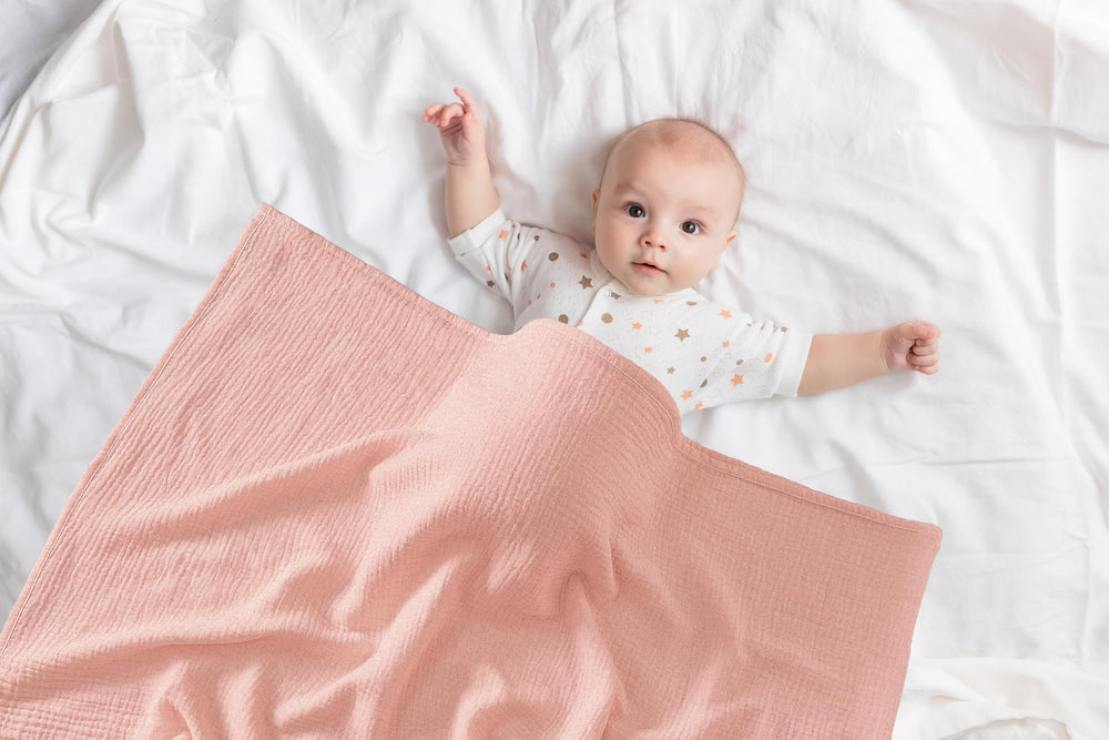 TADO MUSLIN packaging and care label emphasizes machine-washable, durable fabric.