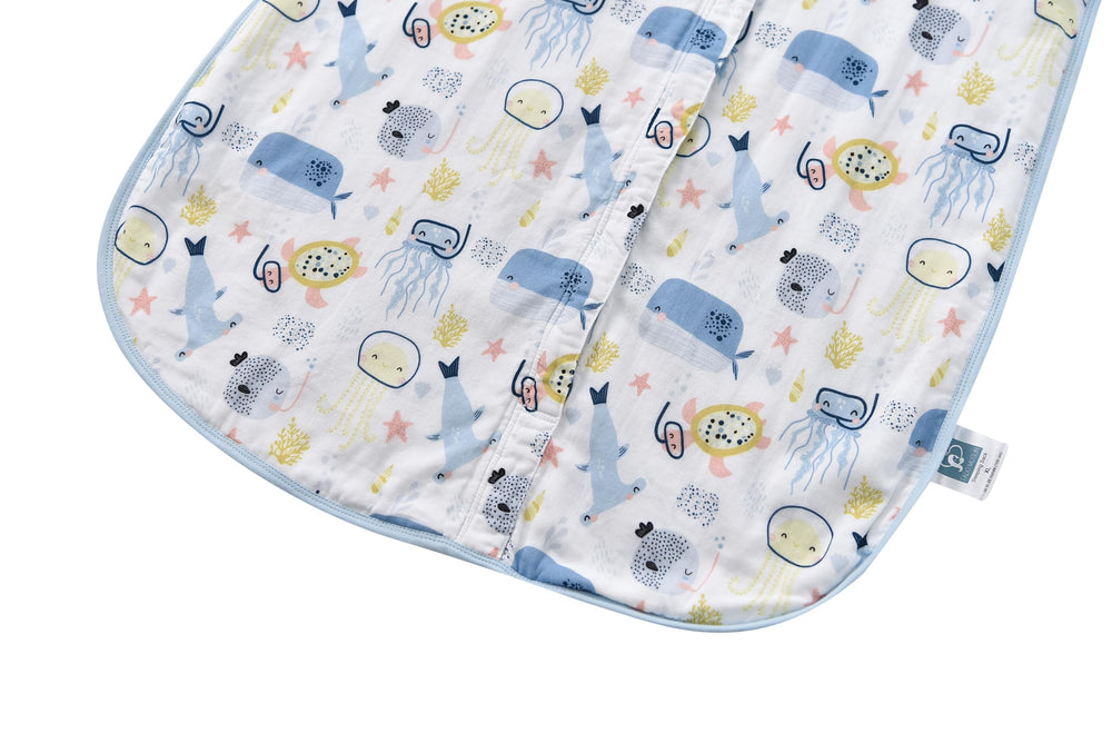TADO MUSLIN OEKO-TEX certification close-up signals fabric safety.