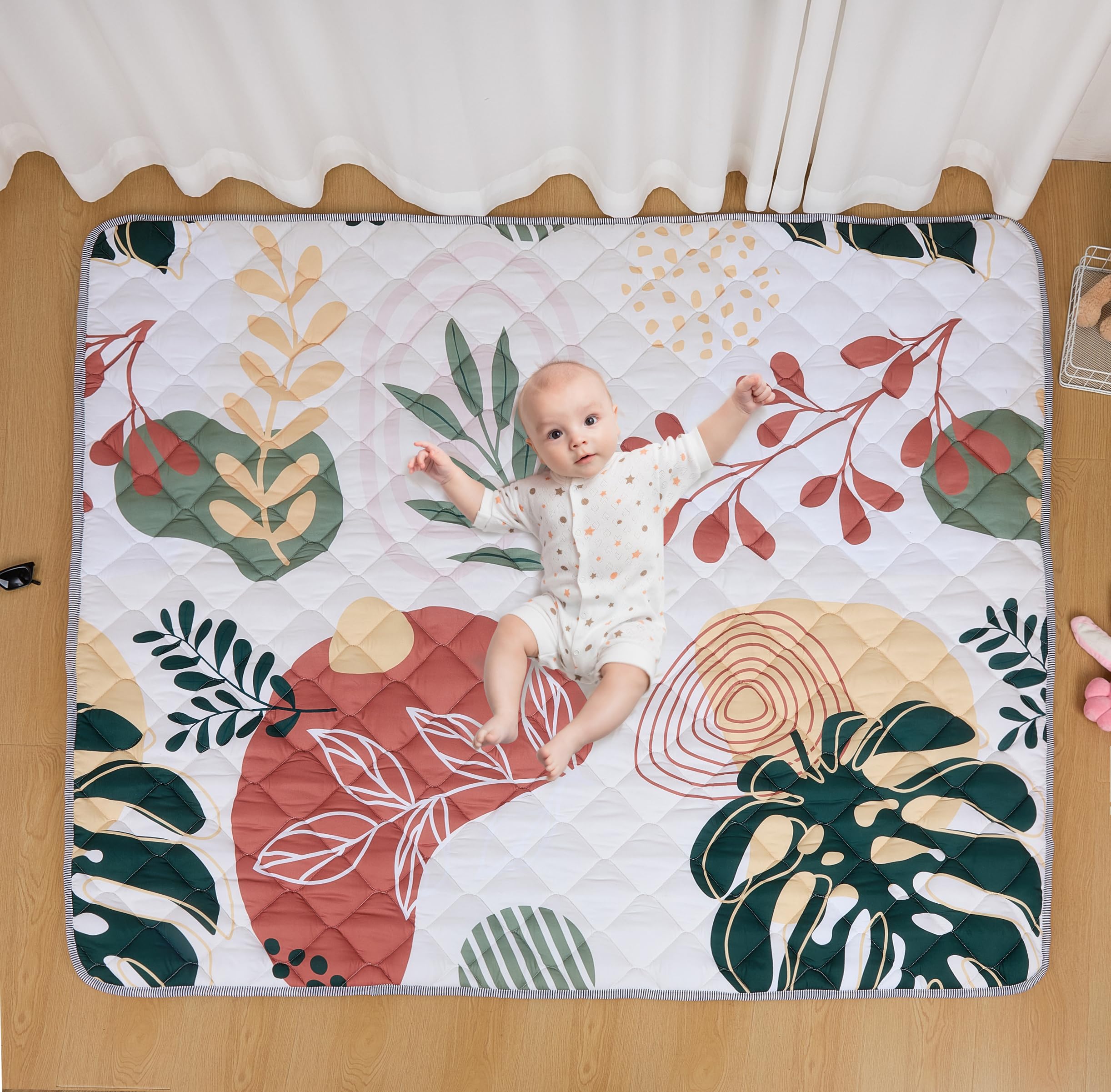 TADO MUSLIN play mat bohemian design offers cozy tummy time in style.
