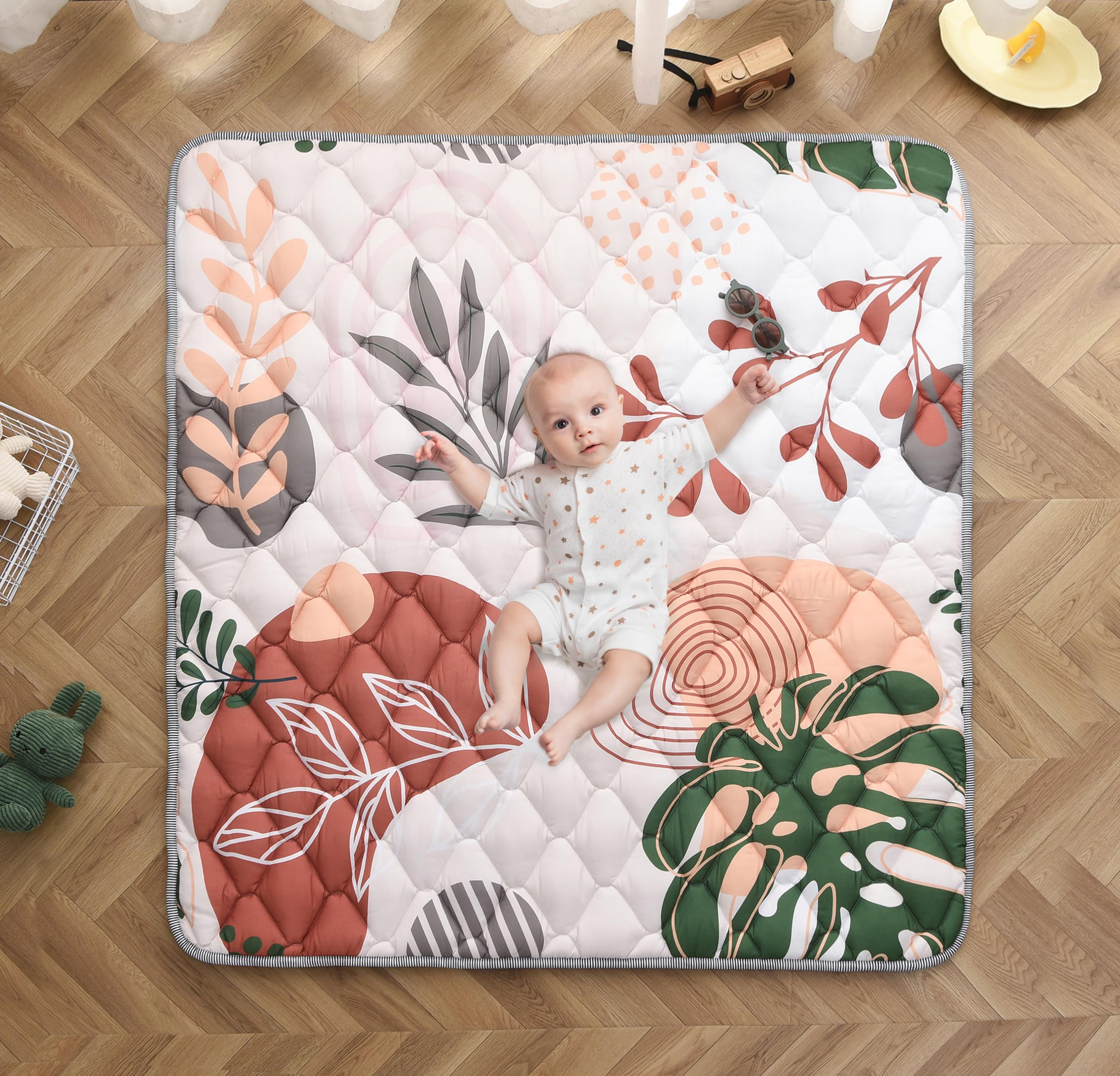 TADO MUSLIN play mat soft-fabric close-up for luxurious baby comfort during tummy time.