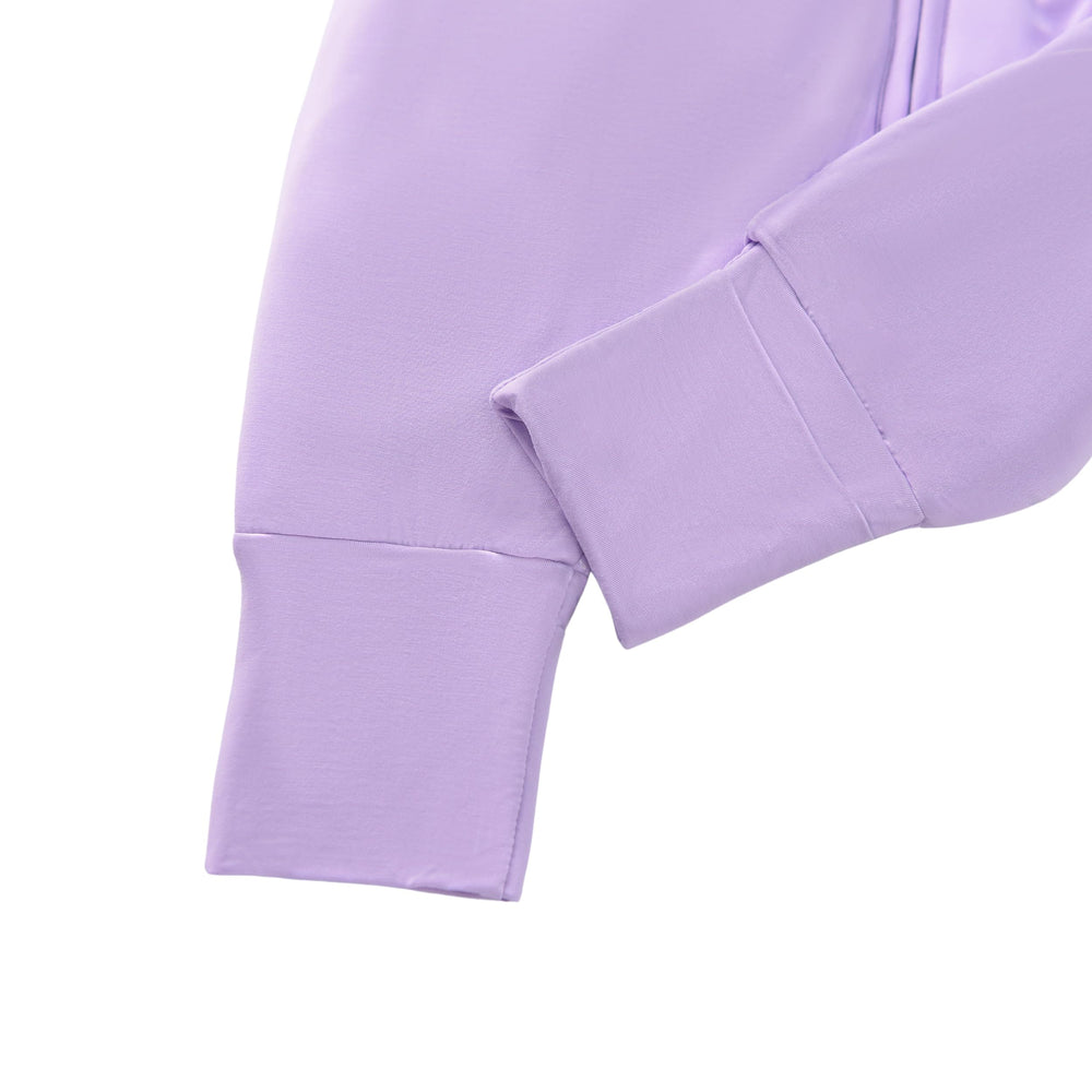 TADO MUSLIN sleep sack 1.0 tog demonstrates all-season layering versatility.