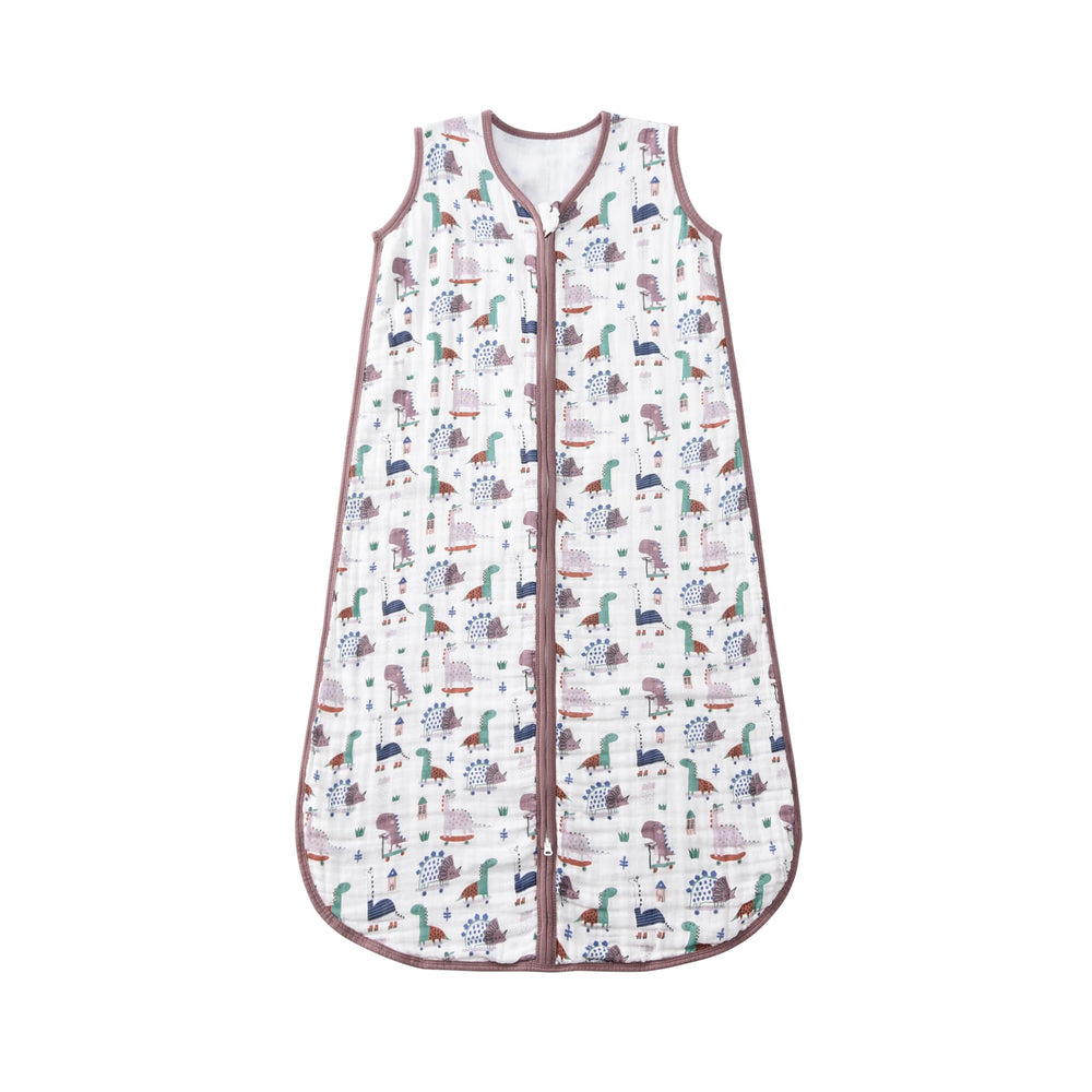 TADO MUSLIN sleep sack dinosaur pattern close-up shows breathable four-layer cotton for comfy naps
