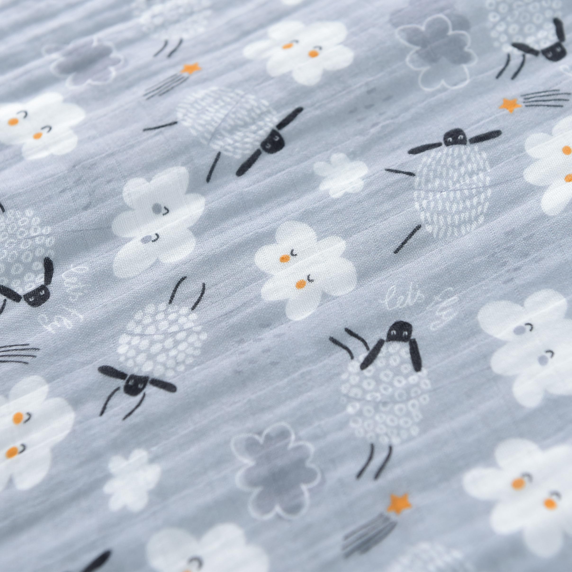 TADO MUSLIN GOTS-certified label highlights safety and quality.