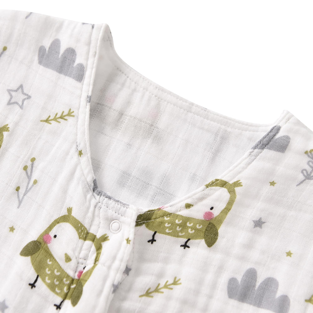 TADO MUSLIN Sleep Sack in crib scene demonstrates safe sleep setup.