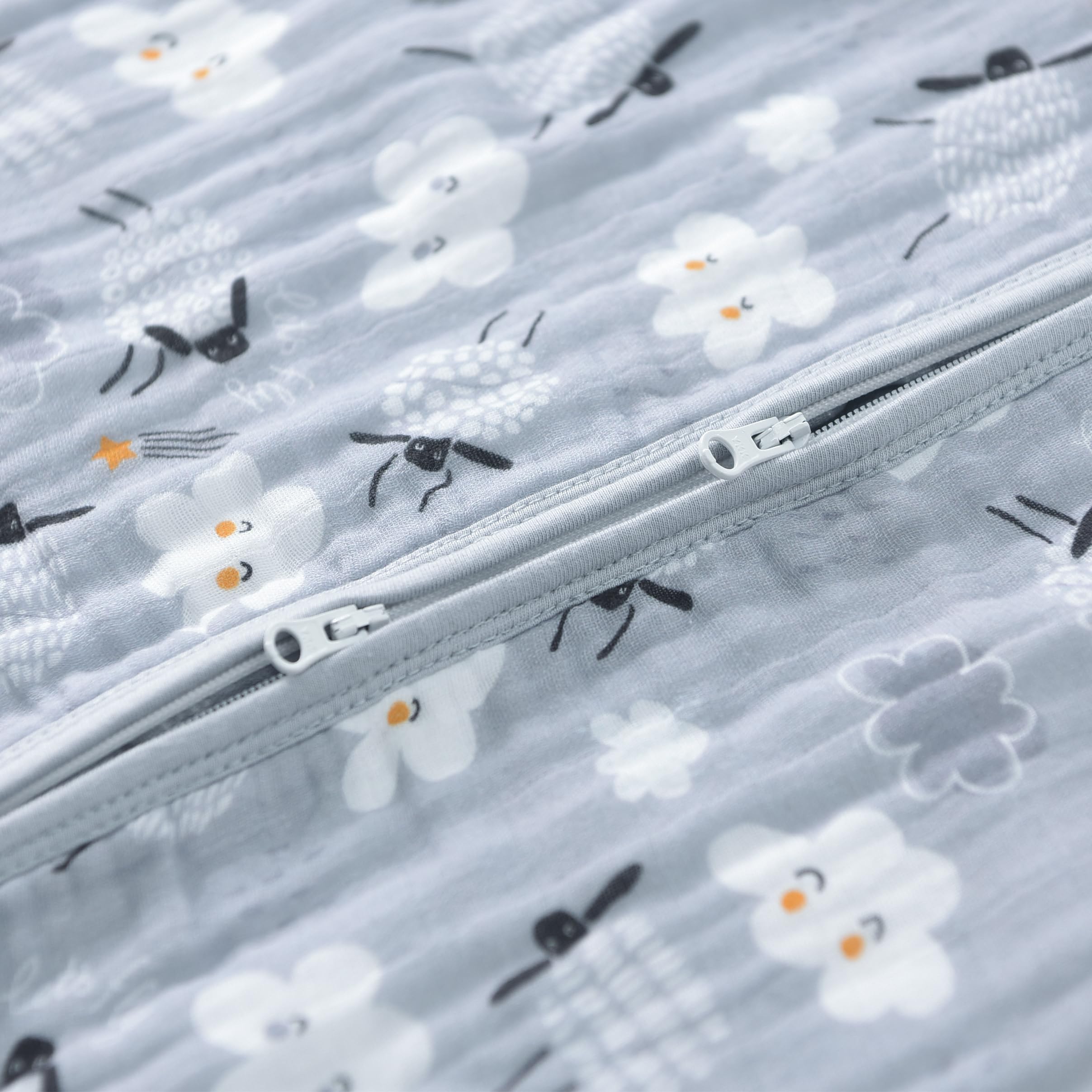 TADO MUSLIN sleep sack pictured in a cozy nursery setting.