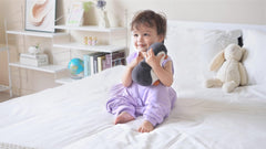 TADO MUSLIN sleep sack two-way zipper highlights simple night-time diaper changes.