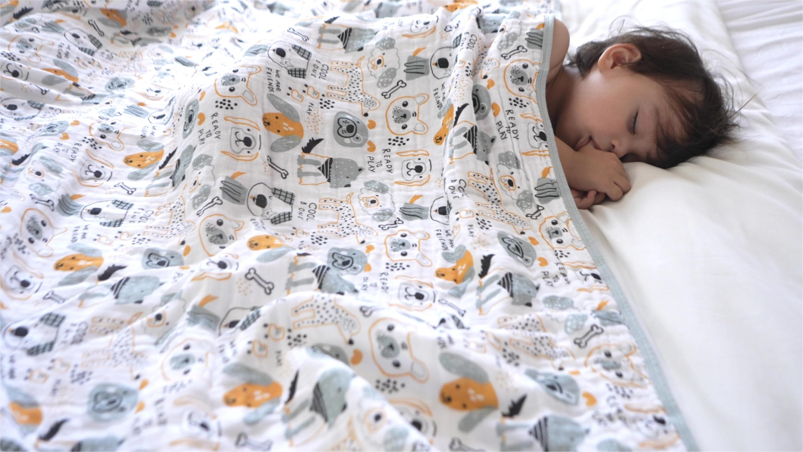 TADO MUSLIN swaddle blanket rhinoceros-design supports breathable warmth during sleep and tummy time.