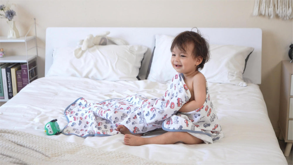 TADO MUSLIN swaddle rhino design features soft texture for tummy time