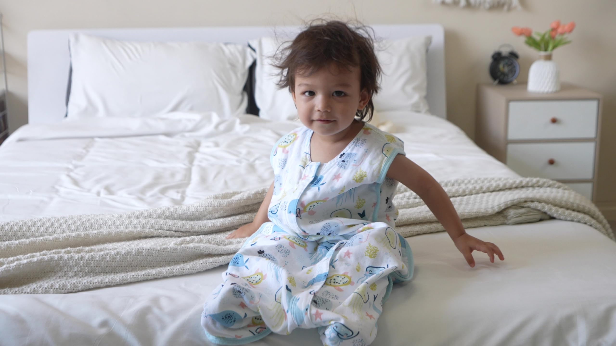 TADO MUSLIN sleep sack back view highlighting roomy fit for growth.
