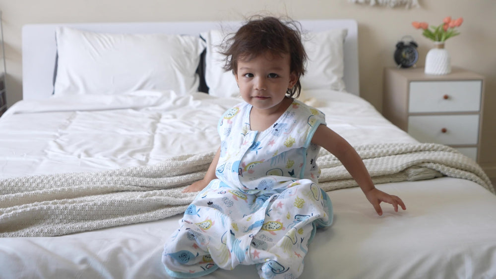 TADO MUSLIN sleep sack back view highlighting roomy fit for growth.
