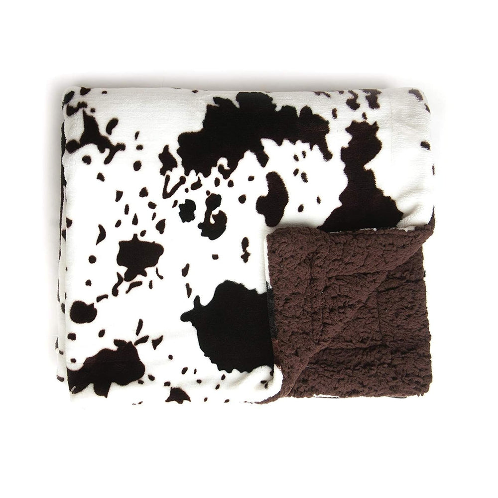 Tadpoles cowhide print double layer blanket provides snug warmth for naps and stroller outings.