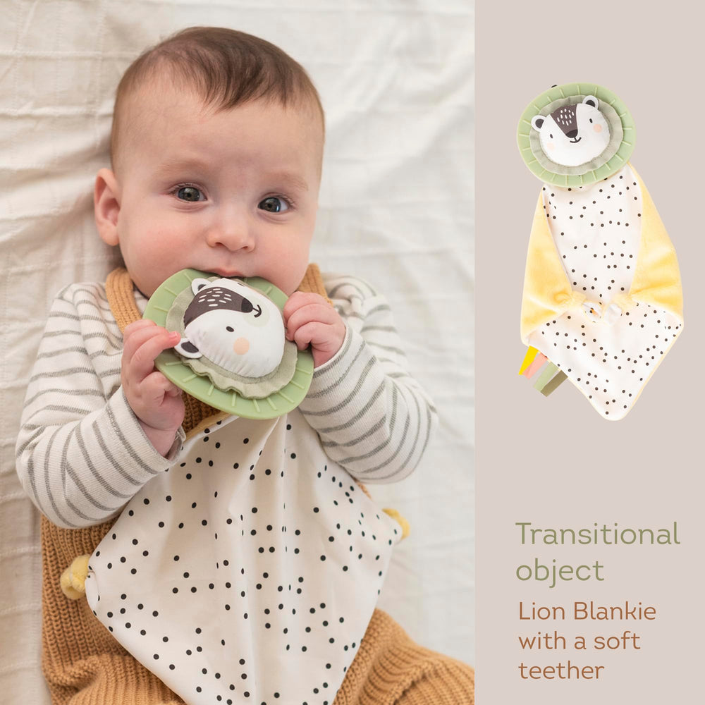 TAF TOYS tummy-time pillow soft-fabric closeup—gentle support for early exploration during play.