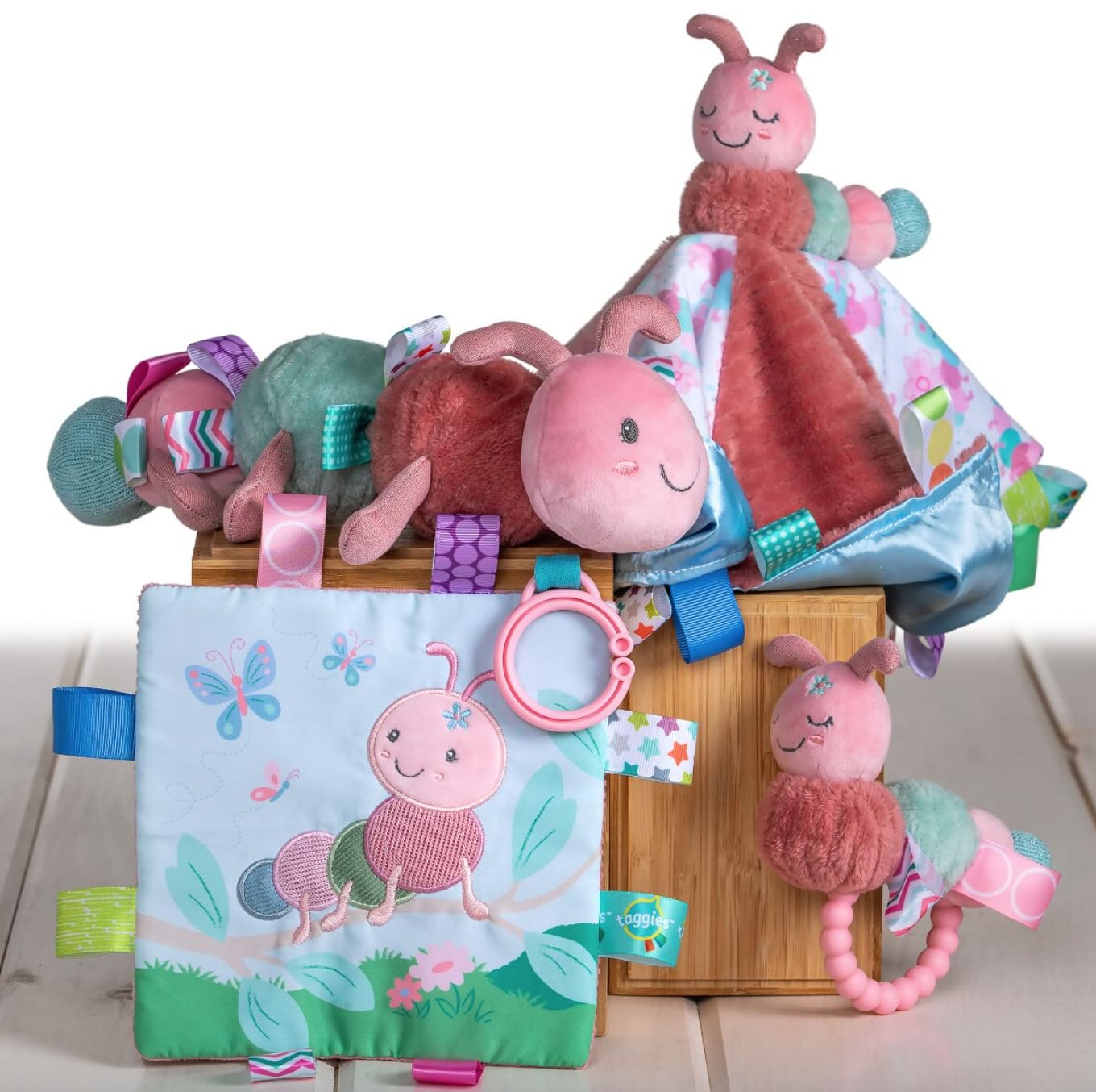 Taggies Camilla Caterpillar toy showing rattle and squeaker for engaging sounds