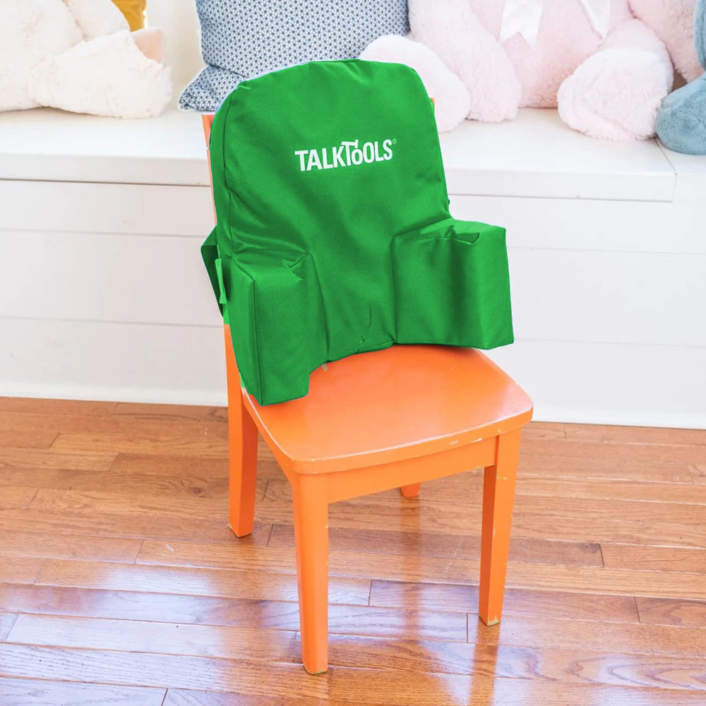 TalkTools High Chair Helper Cushion with clean vinyl surface for quick, hygienic cleanup.