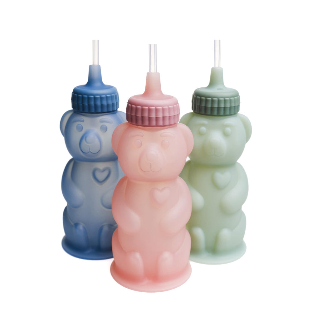 TalkTools Honey Bear cup semi-translucent body highlights visible liquid levels.
