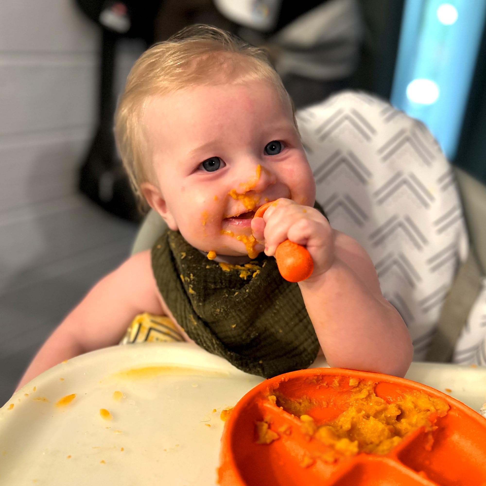 TalkTools ITSY spoons Tangerine parent handling during meals.