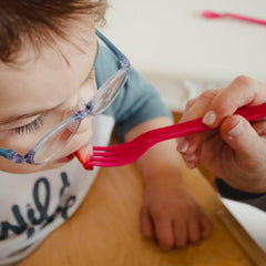TalkTools Magenta Fork handle enables easy hand-over-hand assistance during meals.