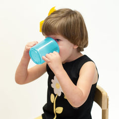 TalkTools recessed lid cup serving milk or juice with ease.