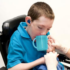 TalkTools recessed lid cup tight seal provides spill protection in action.