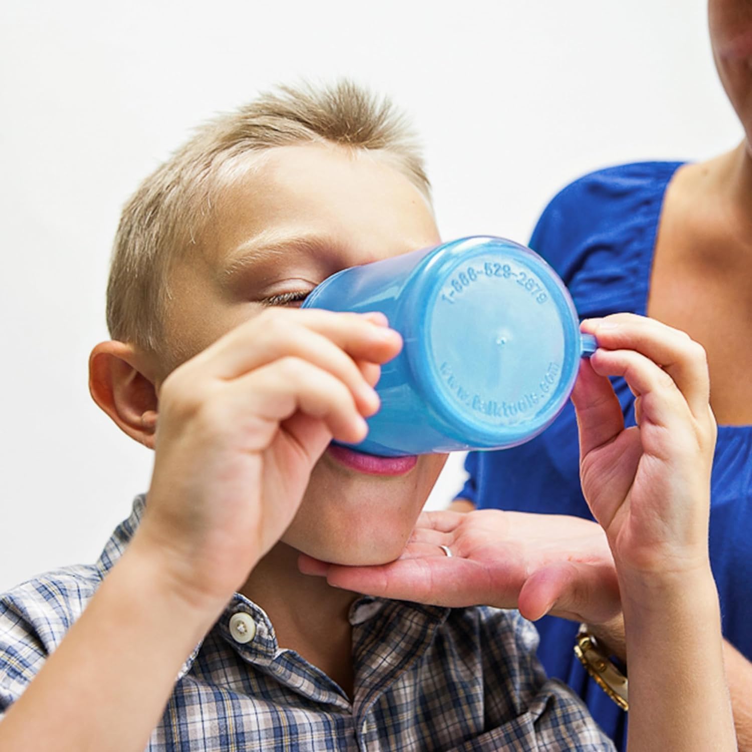 TalkTools recessed lid cup supports toddler transition to independent sipping.