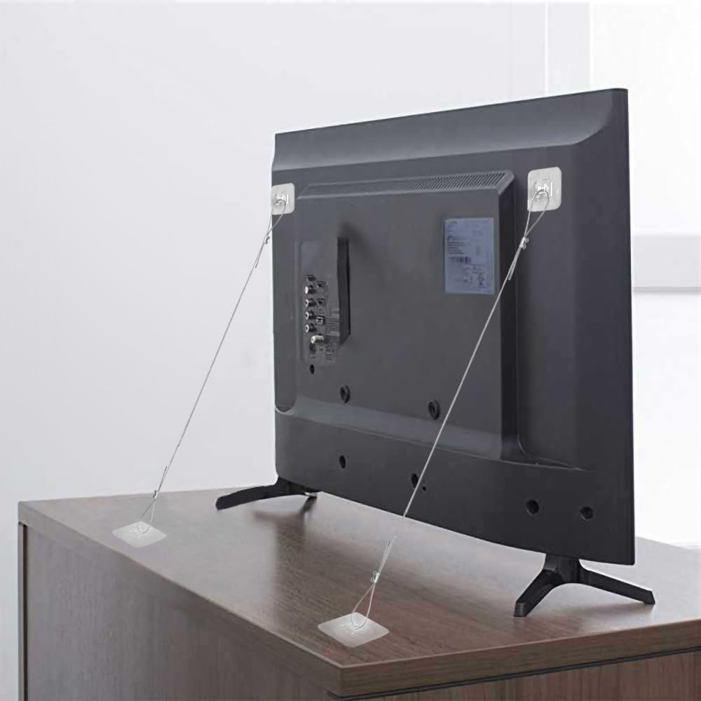 TAMDESG TV safety strap 39in on a wall for secure placement