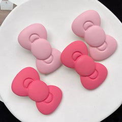 Tangseajiao pink bows hair clips set ready for pigtails and buns in everyday styling.
