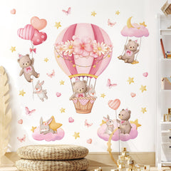 Tanlaby pink hot air balloon wall sticker adds dreamy nursery ambience.