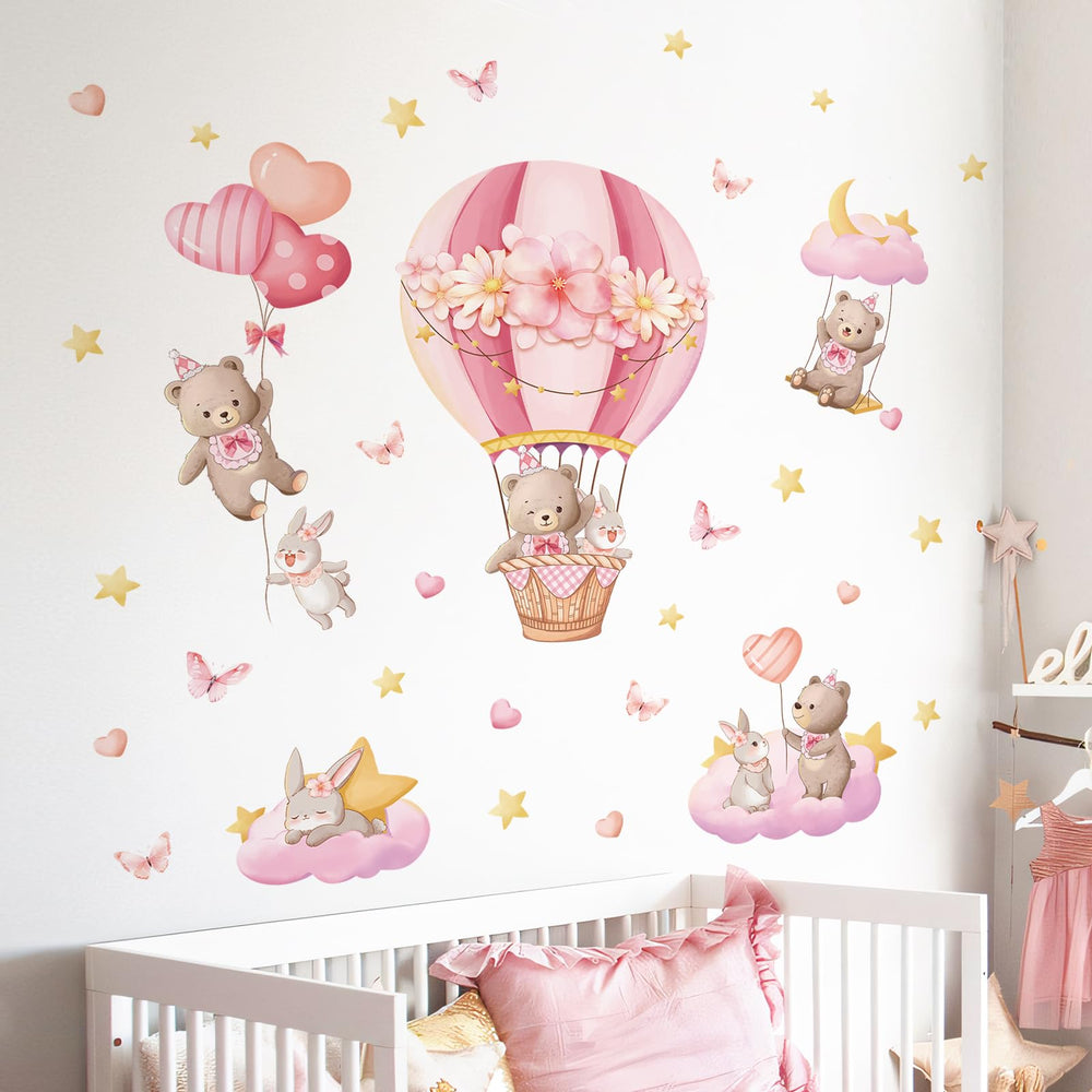 Tanlaby stars, hearts and butterflies decorate walls with whimsy.