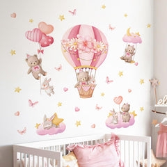 Tanlaby stars, hearts and butterflies decorate walls with whimsy.