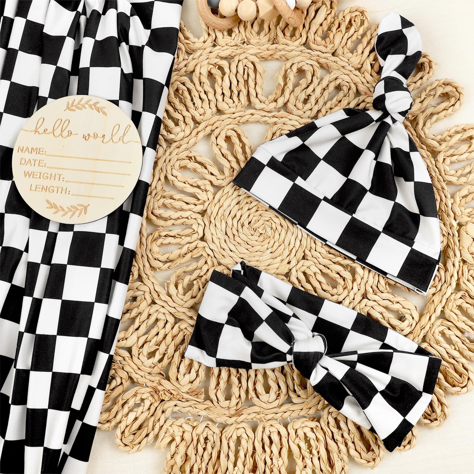 TANOFAR headband in black checkerboard coordinates with the blanket for gentle baby styling.