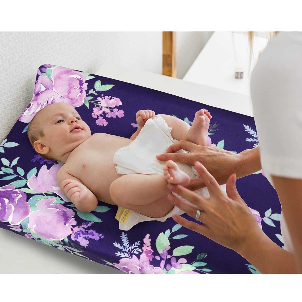 Tanofar machine-washable changing pad cover for easy cleaning and long-lasting use.