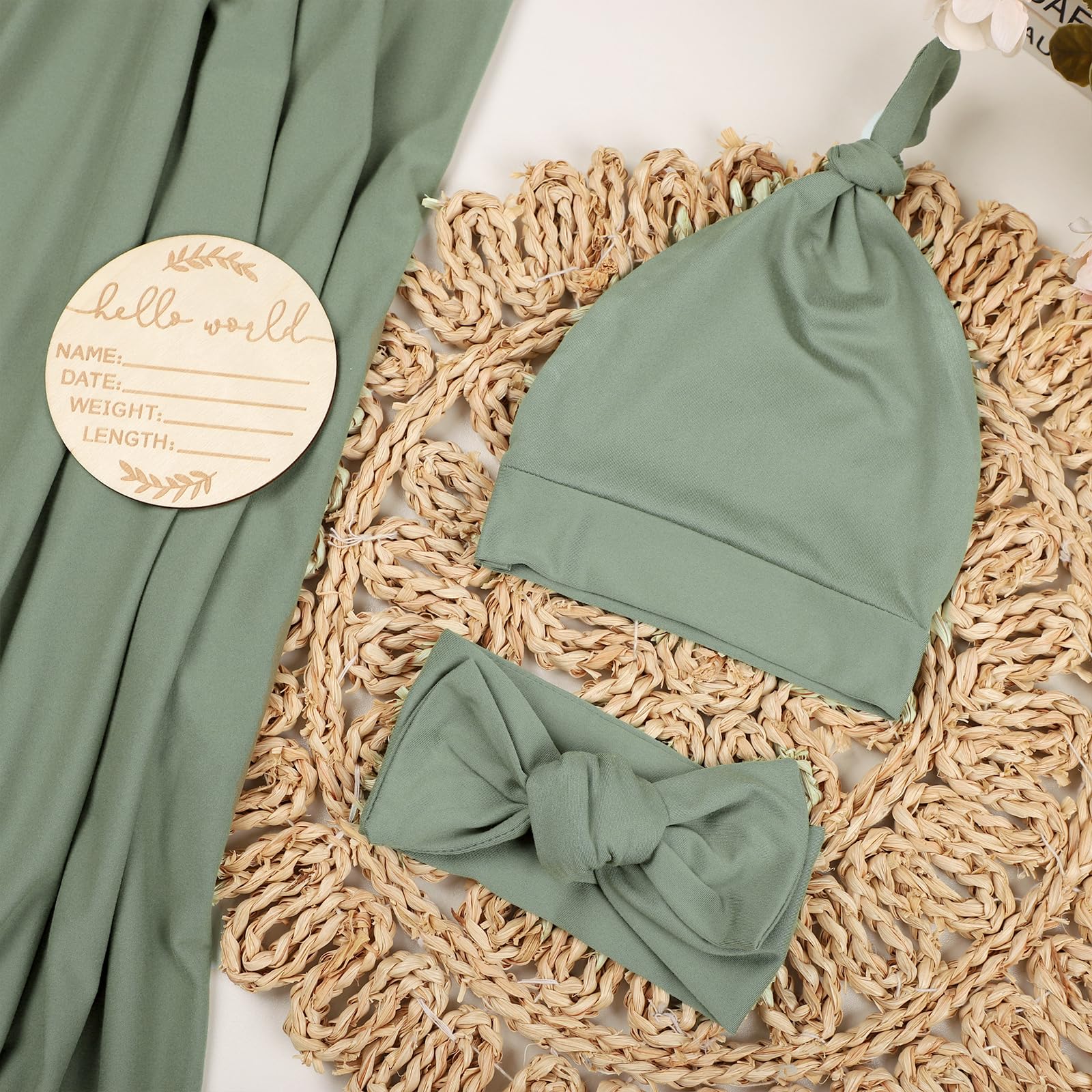 TANOFAR swaddle green headband model demonstrates stretchy fit for secure, cozy wear