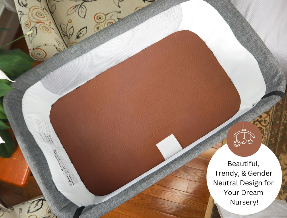Tansy Panda bassinet sheet with 360-degree elastic for secure, wrinkle-free fit.