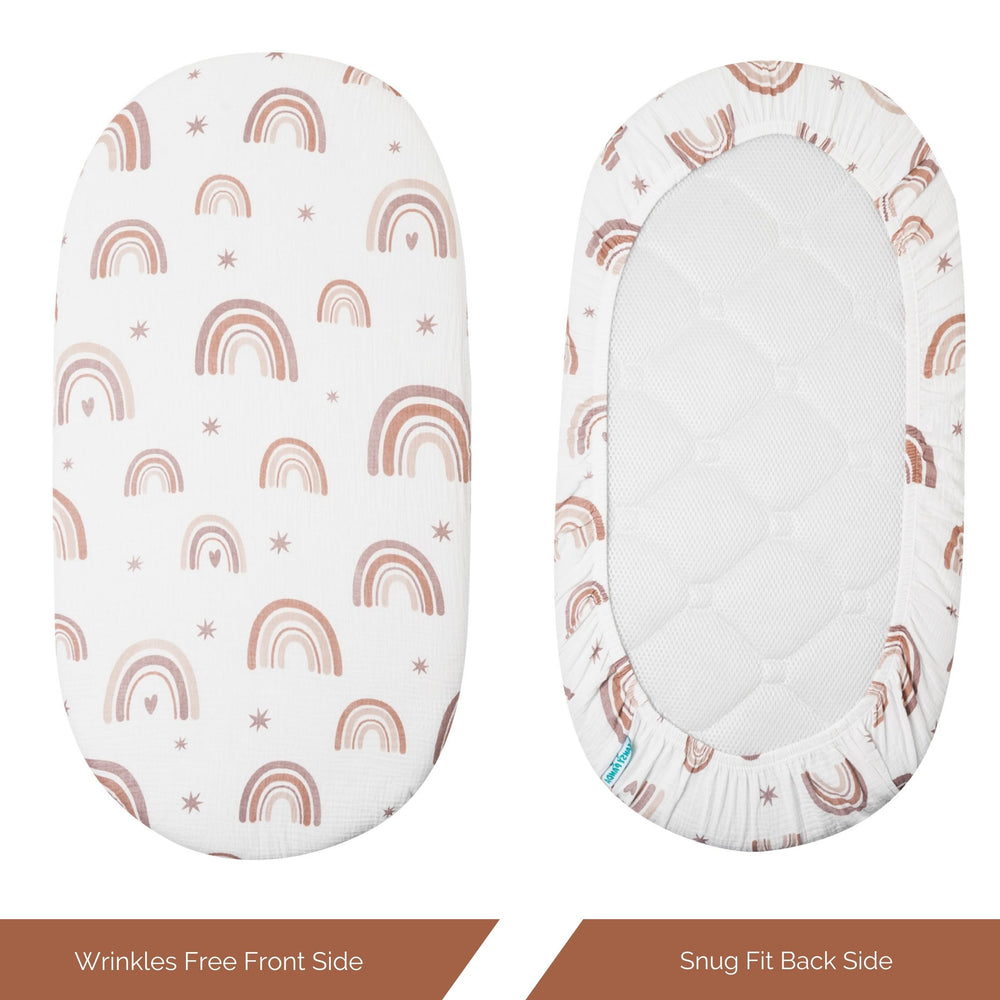 Tansy Panda rainbow-pattern bassinet sheet adds playful nursery detail.