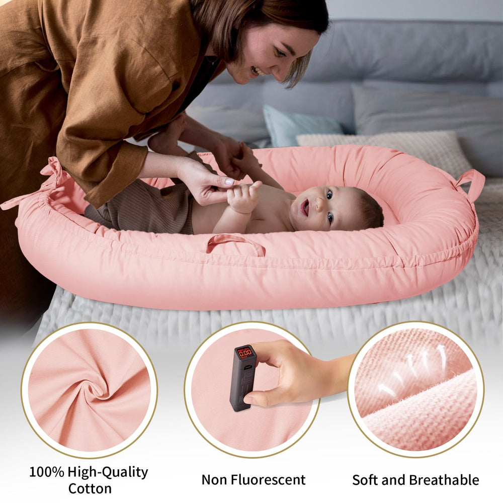 TARJODGY baby lounger features heart-shaped ties for charming nursery styling.