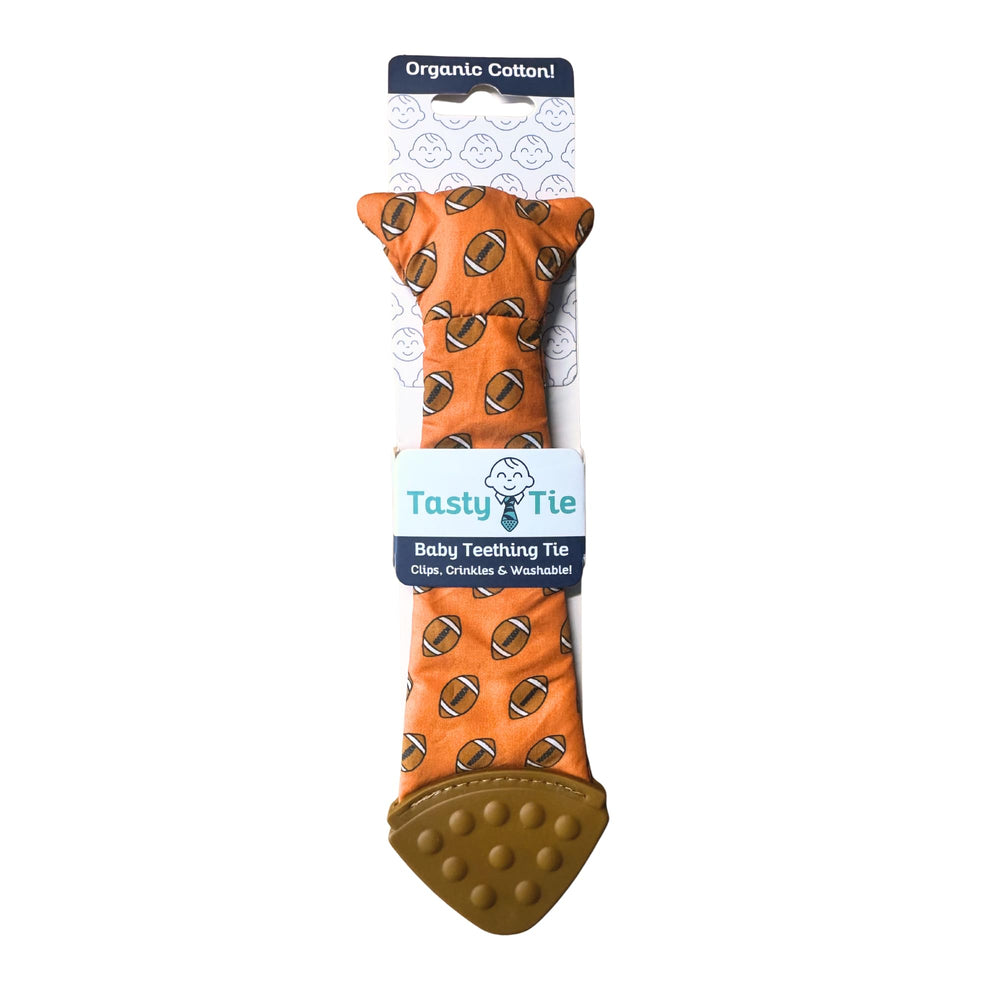Tasty Tie football teething tie for baby-safe chewing and sensory play.