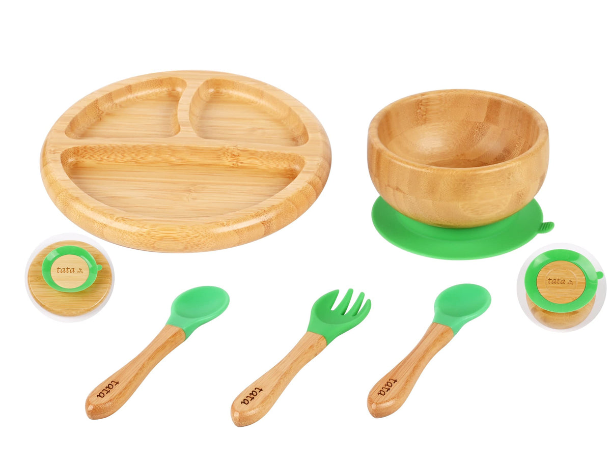 TATA AMG bamboo suction plate close-up with divided sections for mess-free BLW meals.