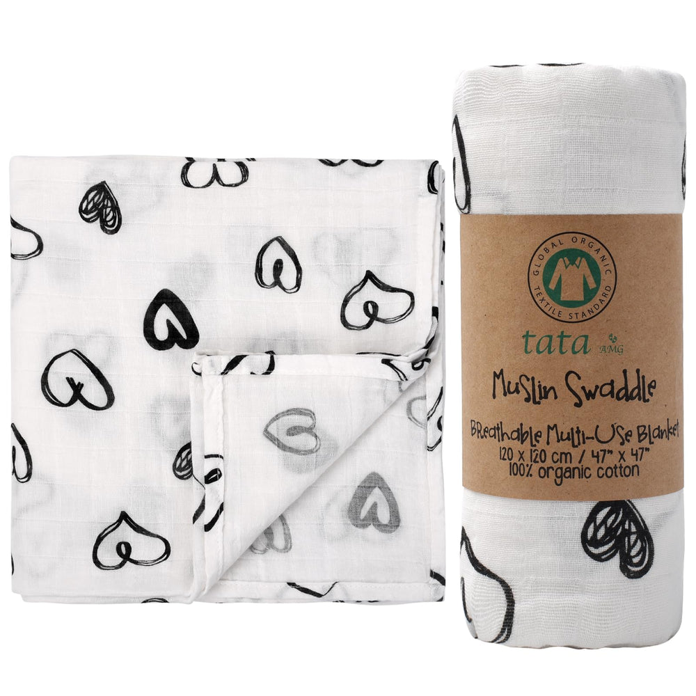 TATA AMG muslin swaddle blanket folded showing soft organic cotton for newborn comfort.